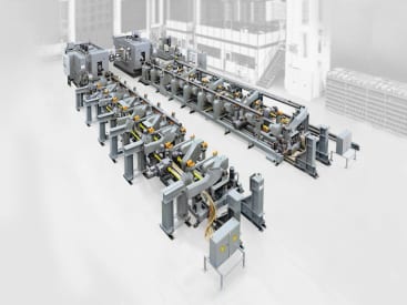 The flexible loading of the workpieces is designed specifically for the customer and fully automated. The transport system does not need to be reset and adjusts itself to individual tasks and workpiece dimensions