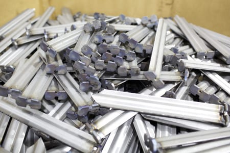 Galvanized stakes for hold downs on a satellite receiver