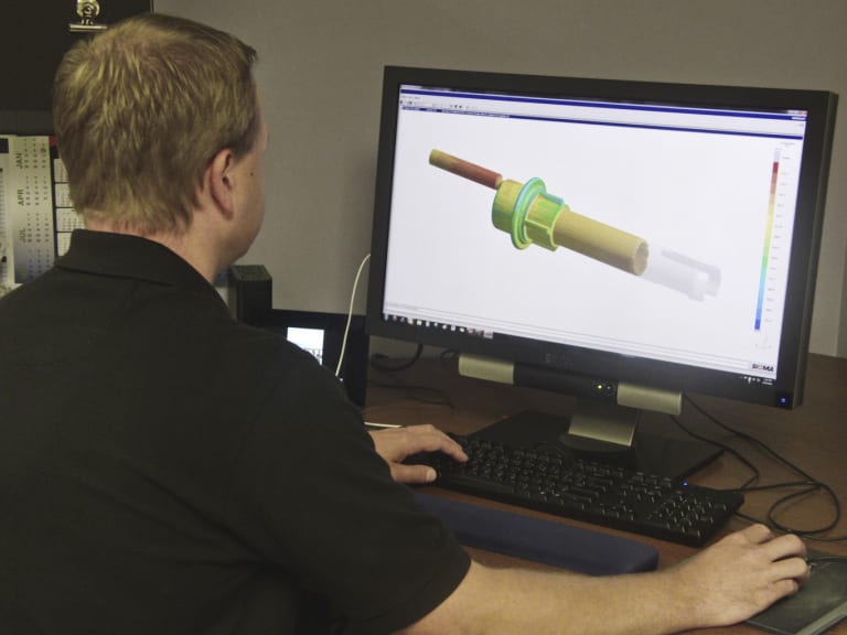 Stafford Frearson, Project Engineer at Tessy Plastics, works on a project using SIGMASOFT at Tessy Plastics in Elbridge, NY.