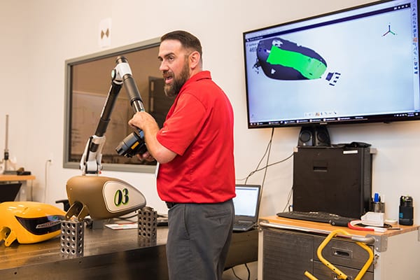 Scanning a motorcycle piece with the ROMER Absolute Arm.