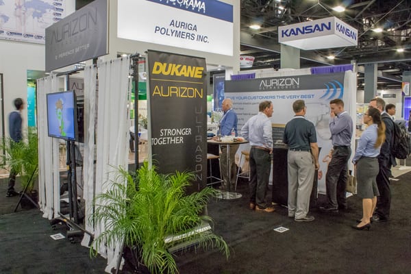 Dukane Booth at IDEA Show - Acquisition of Aurizon
