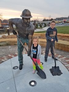 Exact Metrology Public Works Statue